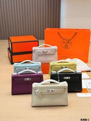 Classic Kelly clutch with silver buckle, upgraded with Swift leather.