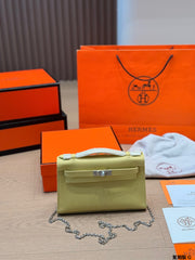 Classic Kelly clutch with silver buckle, upgraded with Swift leather.