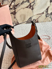 Miu Miu brown leather crossbody bag