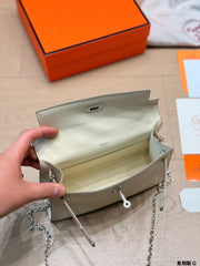 Classic Kelly clutch with silver buckle, upgraded with Swift leather.