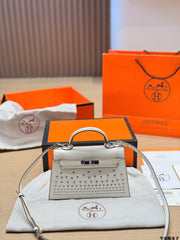 Leather version, Hermès Kelly Mini II studded bag