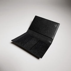 Gucci Essence Classic passport case - black GG canvas