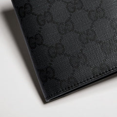 Gucci Essence Classic passport case - black GG canvas