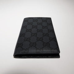 Gucci Essence Classic passport case - black GG canvas